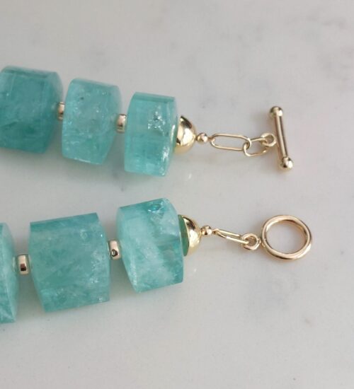 large-aquamarine-gold-beaded-necklace